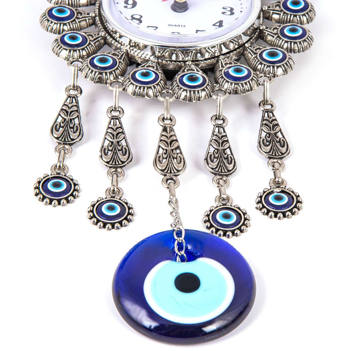 Metal wall clock with evil eye beads.